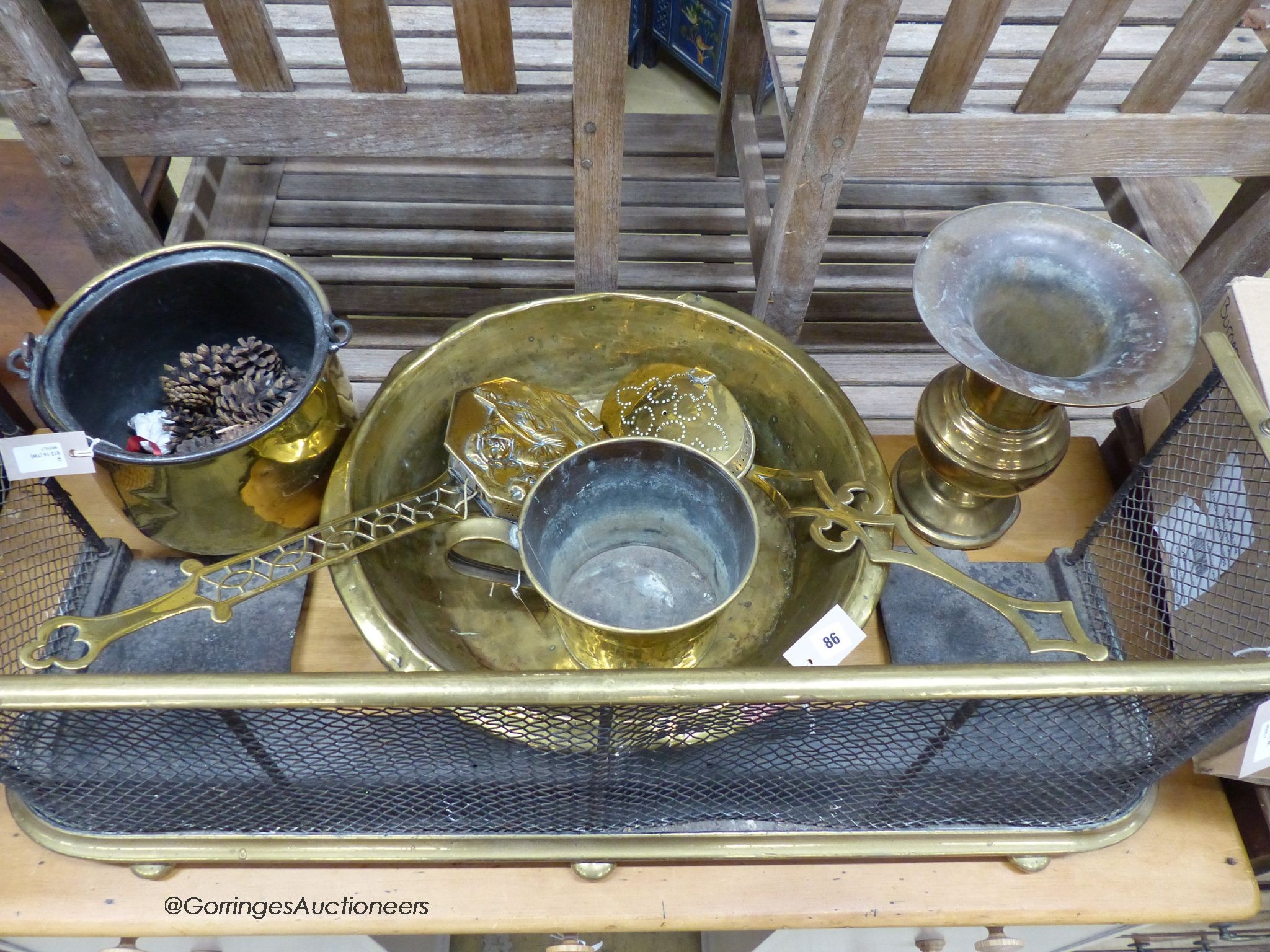 A Victorian brass and steel mesh fender and sundry other metalware